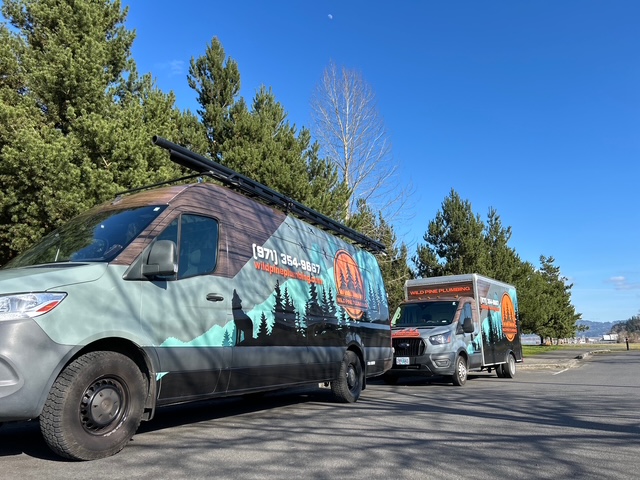 Wild Pine Plumbing service vans — Drain Cleaning in Portland, Oregon