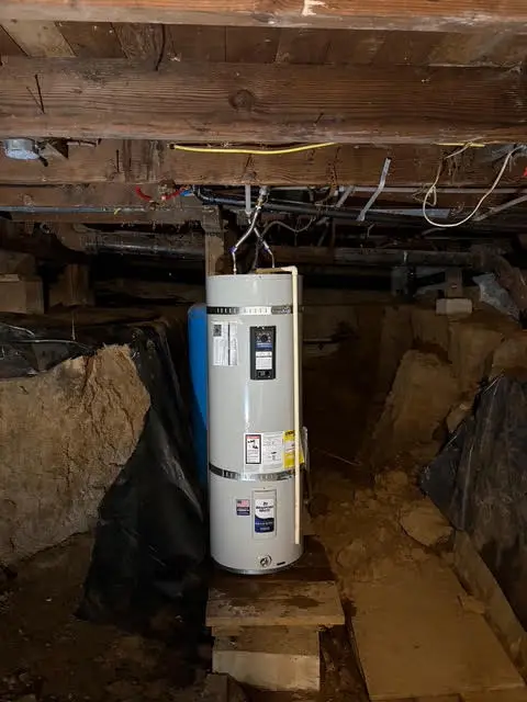 Crawlspace tank water heater replacement by Wild Pine Plumbing in Portland, Oregon